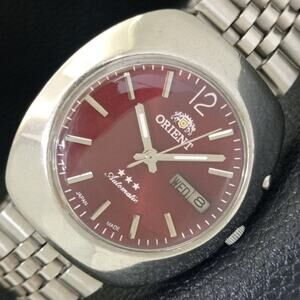 Vintage 1977 Orient Automatic Mens Silver Watch W/daydate & Red accents
